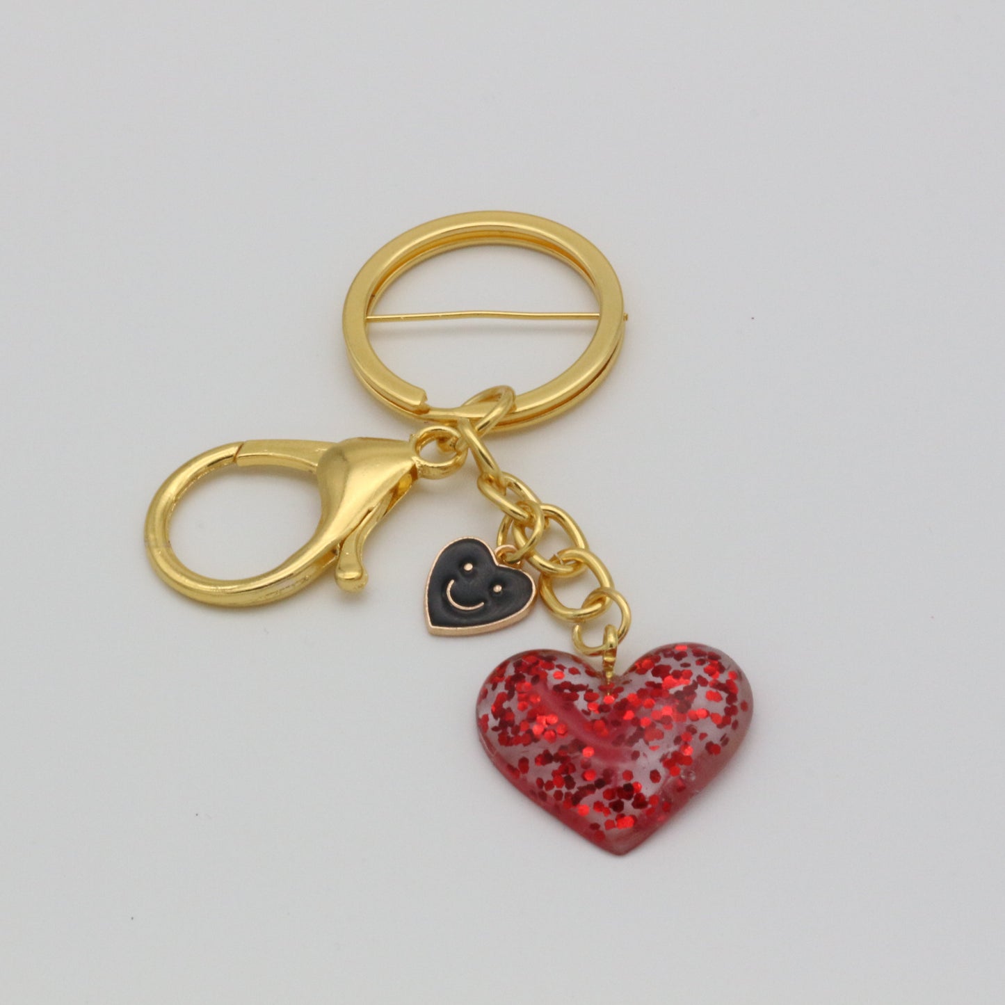Herzanhänger mit Smiley Charm