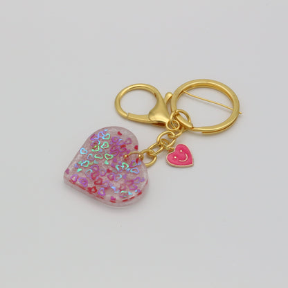 Herzanhänger mit Smiley Charm