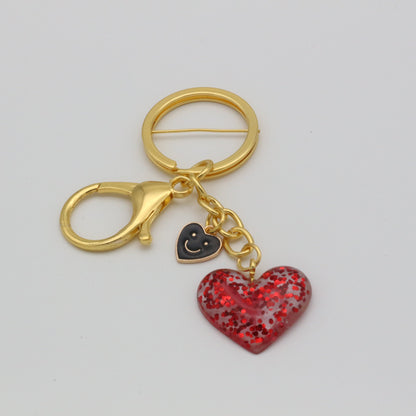 Herzanhänger mit Smiley Charm
