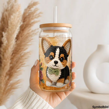 Häkel-Corgi im Blumenbeet als UV-DTF Sticker auf einem 16oz Glasbecher