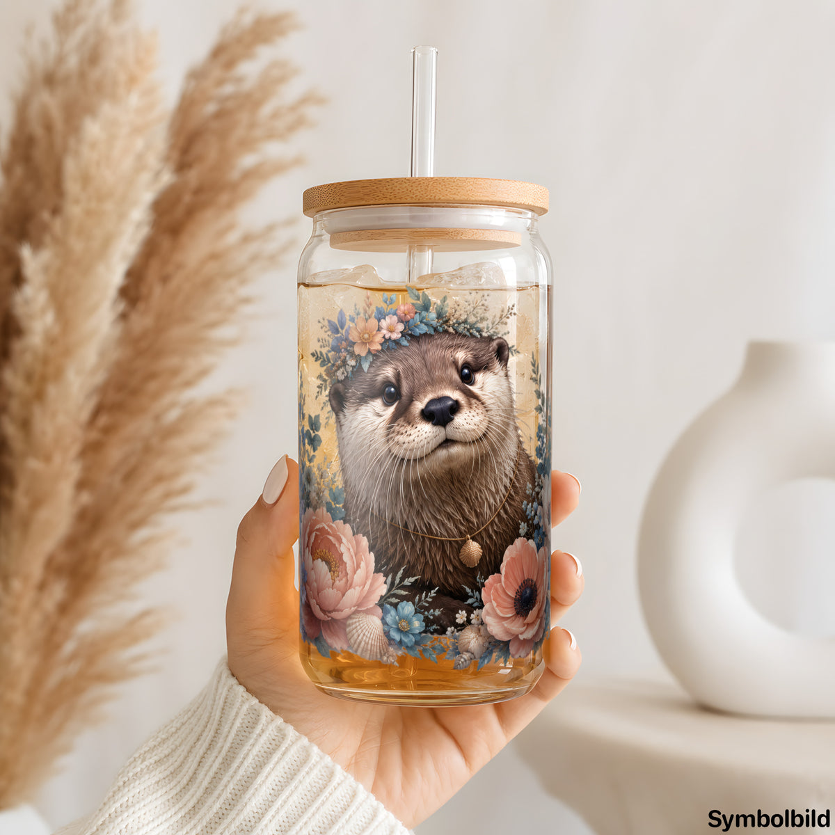 Otter mit Muscheln als UV-DTF Sticker auf einem 16oz Glasbecher