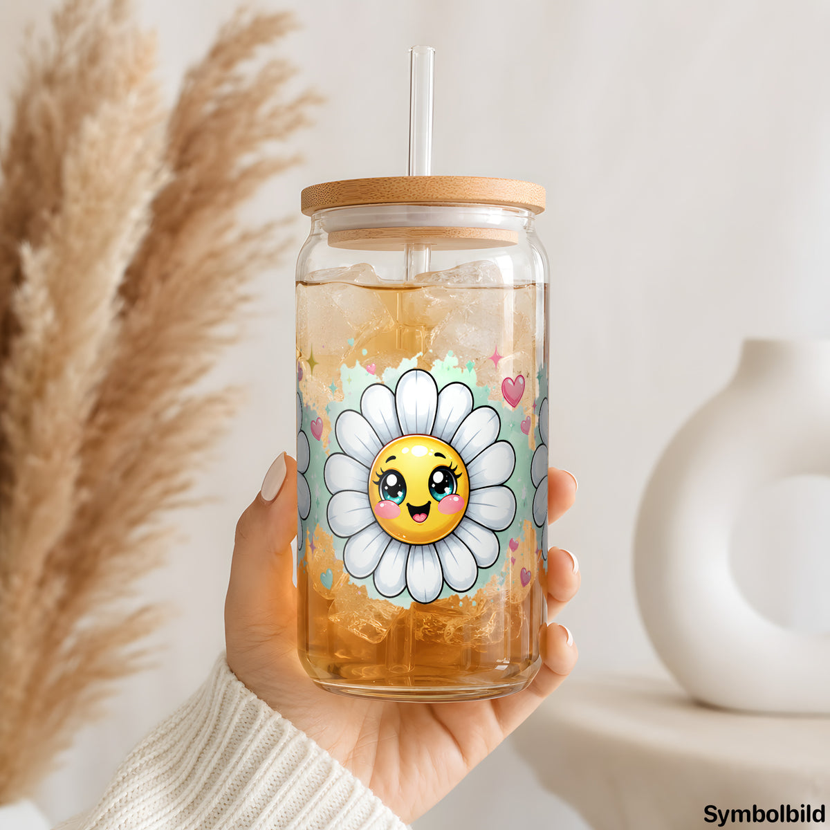 Gänseblümchen mit Gesicht als UV-DTF Sticker auf einem 16oz Glasbecher