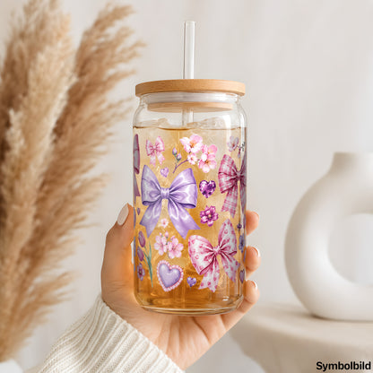 Blumige Schleifen als UV-DTF Sticker auf einem 16oz Glasbecher
